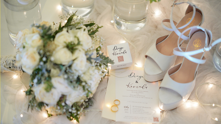 Bridal wedding accessories with a flower bouquet and wedding card