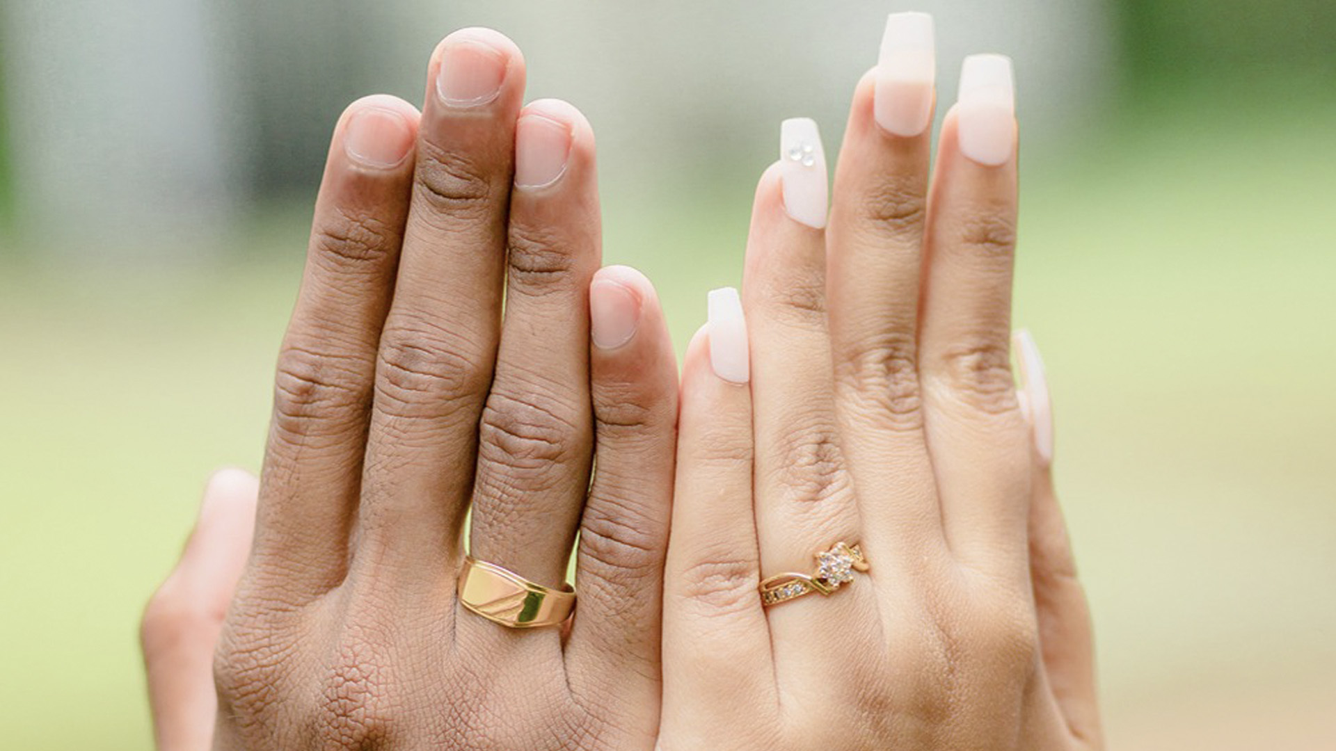 image of bride and groom's hands with wedding rings, shows marriage and love, captured beautifully in this wedding moment. mangala yojana 2024, matrimony sri lanka, sl marriage proposals, mangala yojana, marriage proposal in sri lanka, Sri Lankan matrimony, Sri Lankan marriage proposal sites