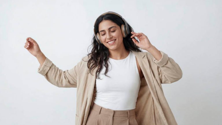 A joyful woman with long dark hair wearing headphones and dancing peacefully, representing modern marriage proposals in Sri Lanka, matrimony Sri Lanka, Lanka brides and grooms, wedding proposal website Mangala Yojana, Poruwa.lk | ශ්‍රී ලාංකීය මංගල යෝජනා, Buddhist matrimony, Catholic marriage proposals, Liyathabara marriage proposals in Sri Lanka, and traditional Poruwa ceremony.